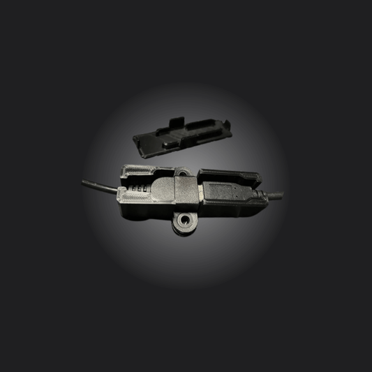 Simagic Link Enclosure showcasing the secure USB connection design, preventing race disconnections.