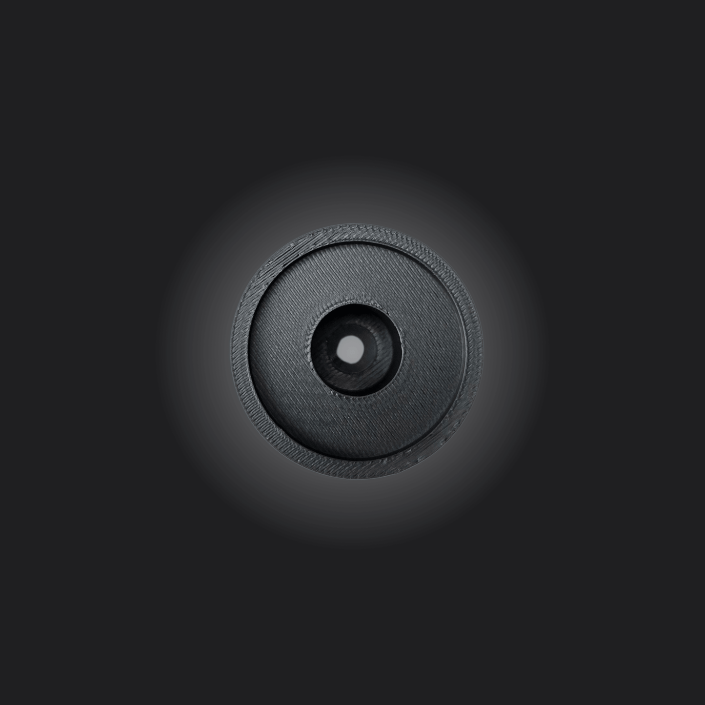 Close-up of a sleek black wheel mount attachment for Simagic and Moza products.