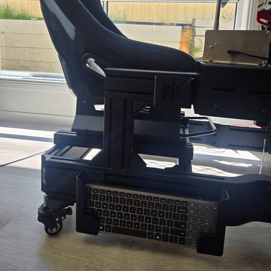 Keyboard Holder for Sim Rigs mounted on aluminium profile racing cockpit, providing easy access to keyboard.