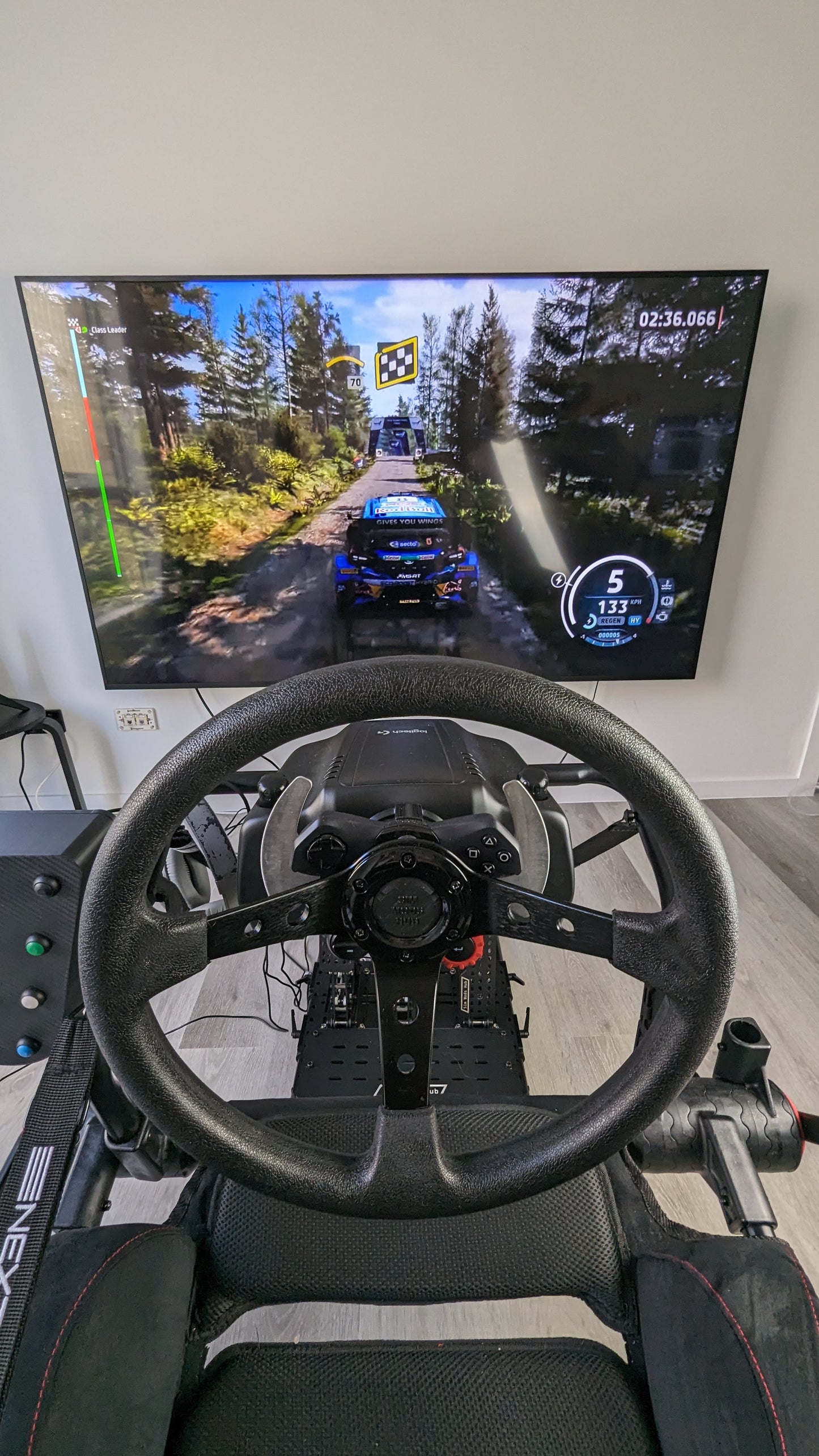 Rally Wheel for Logitech G29/G923/G920/G27 displayed with a racing game on screen for immersive driving experience.