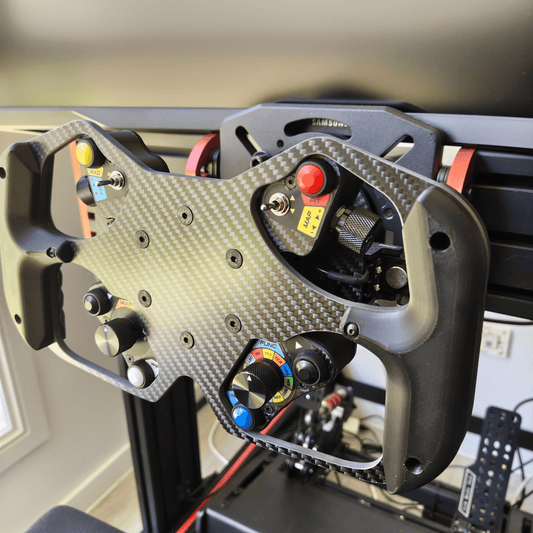 Close-up view of the Formula Wheel Hub showcasing buttons and ergonomic design for sim racing.