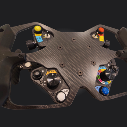 Close-up view of the Formula Wheel Hub showcasing its carbon fiber design and control buttons for sim racing.